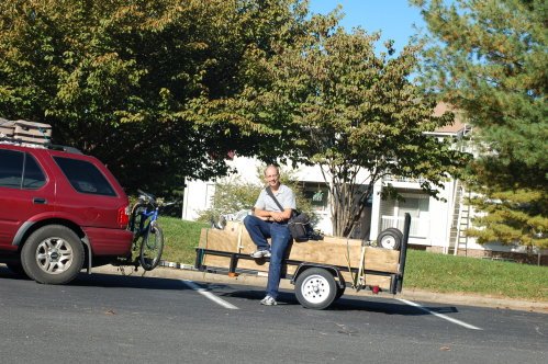 Ron resting on the utility trailer after arriving in Virginia. 