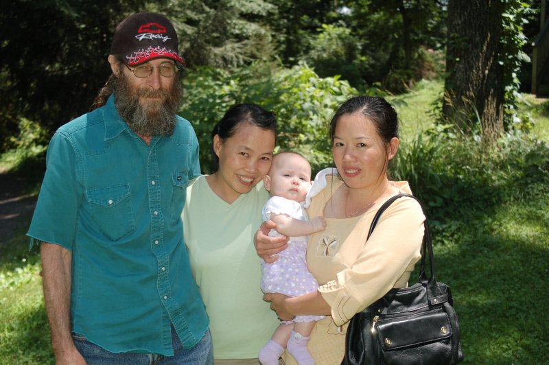Winnie, her Friend Lilly, Baby Son, and Husband. Winnie and Lilly Knew Each Other In China