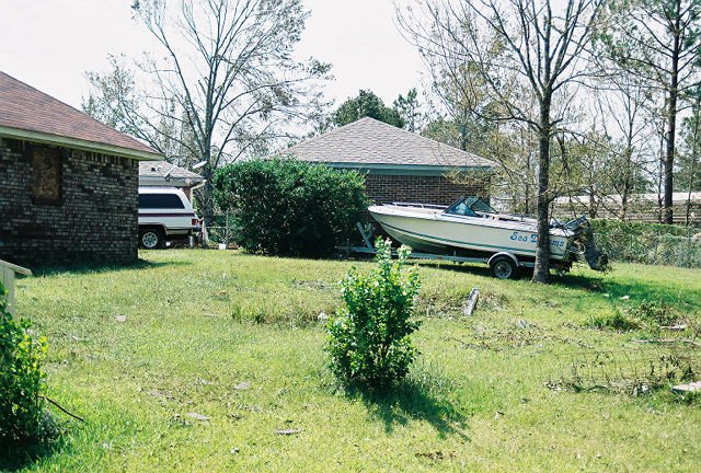 After Hurricane Katrina - My boat "Sea Dream" washed halfway down the backyard.