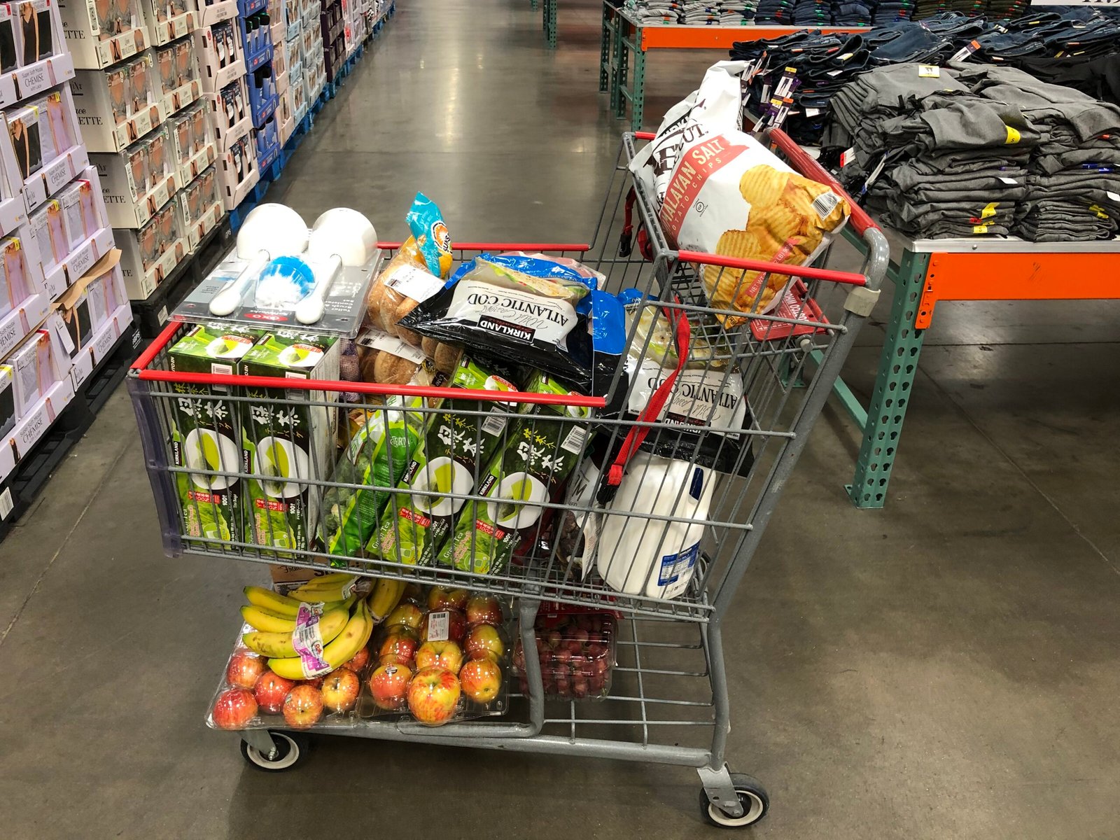 A Shopping Cart Filled With Groceries