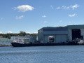 Barge with Submarine Hull Section at Electric Boat Shipyard, Groton, Connecticut