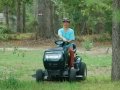 Winnie Driving the Lawnmower