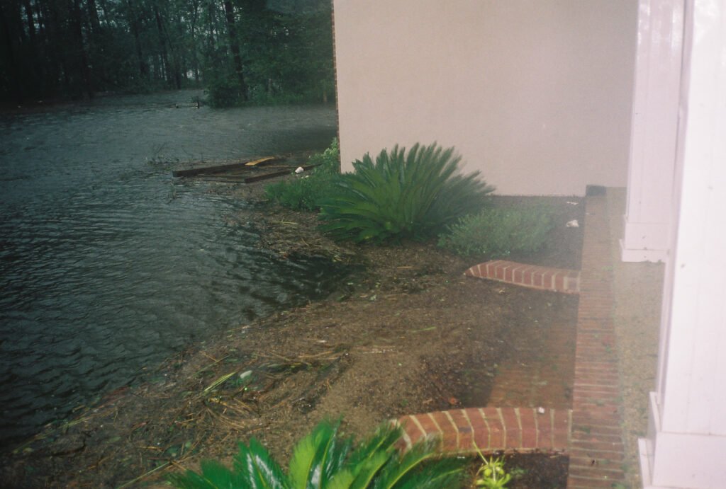 Flood waters creep up the stairs during Hurricane Katrina's Landfall