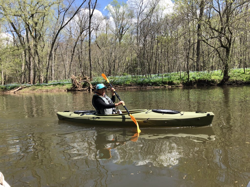 Winnie Going Solo in the Trophy 126 Kayak