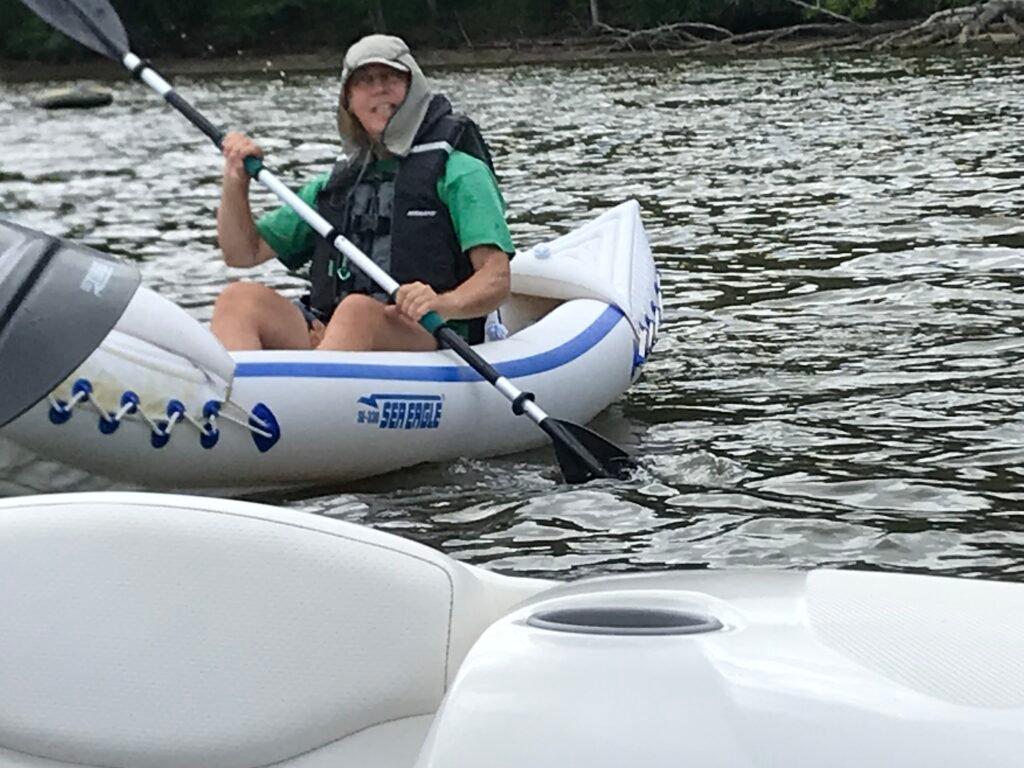 Ron Kayaking off Sea Dragon in Gunston Bay