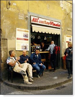 people talking in front of a cafe as the essence of social media