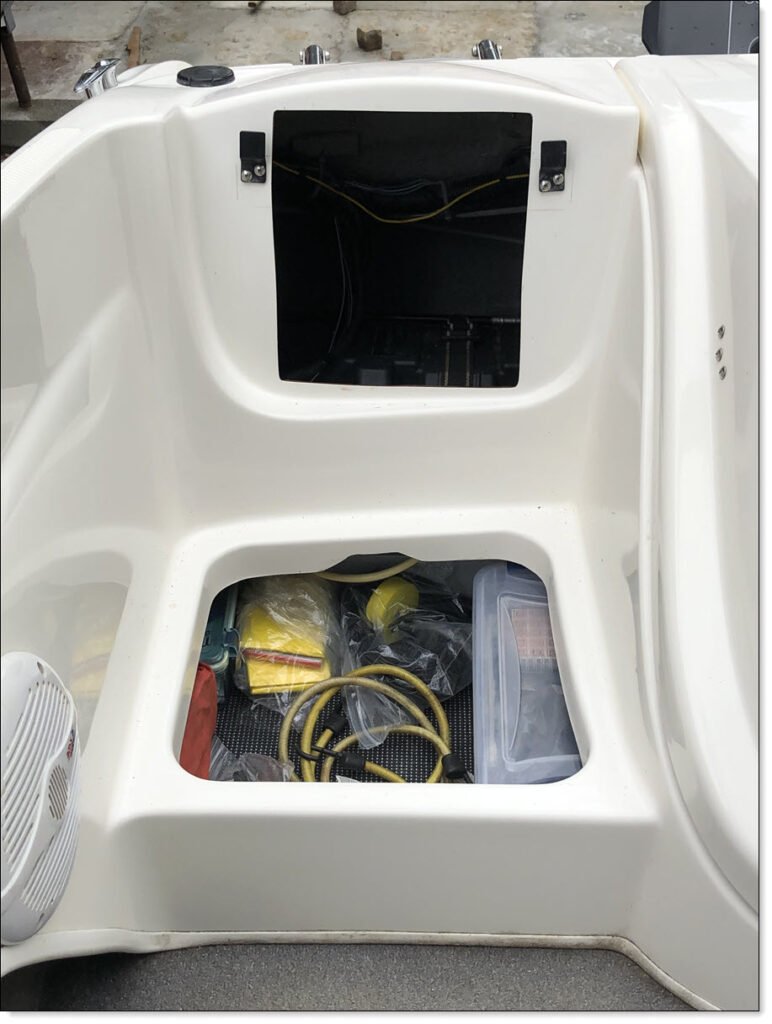 Showing the Underseat Storage Area, and Access to the Rear Equipment Bay of Bayliner 175BR