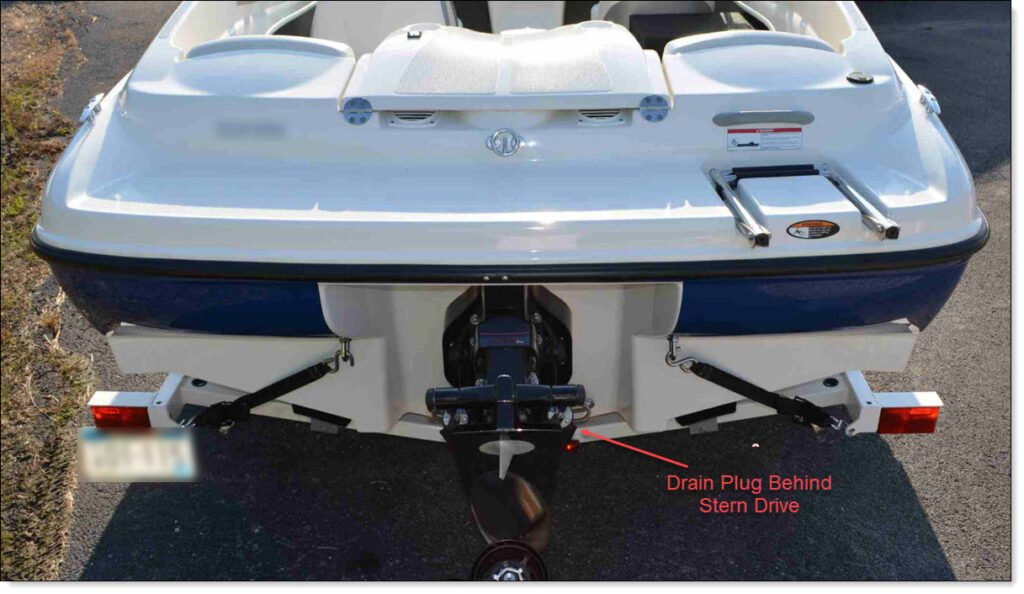 Not Sea Dragon, but Stern view of a 2010 175BR. Showing the split port and starboard Transoms, with Recessed Pocket for the Stern Drive Mount. The Swim Platform Overhangs the Entire Transom.
