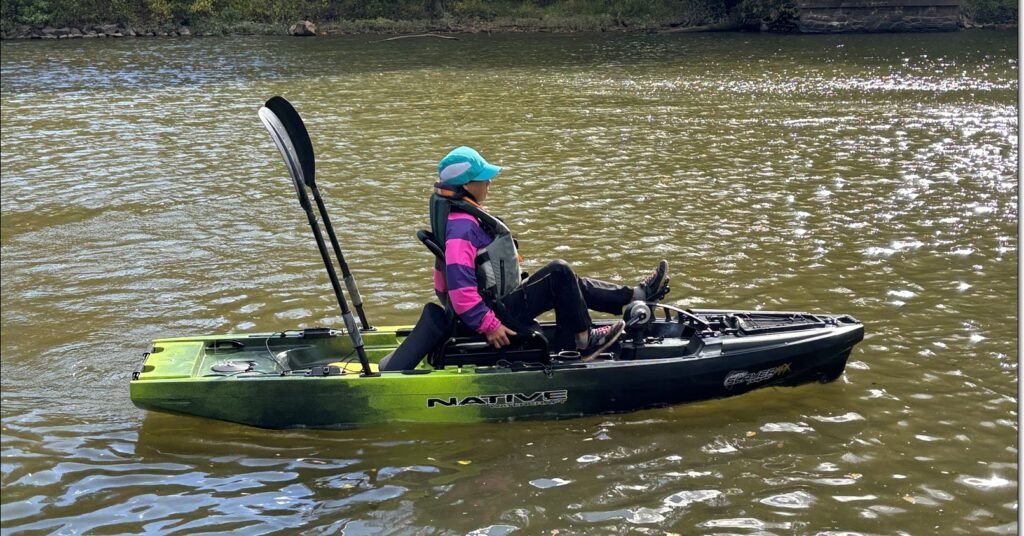 Winnie on a Native Watercraft pedal-drive Max Slayer model kayak. 