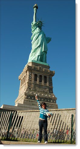 statue of liberty with winnie in front posing as the statue. Photo taken October 2010