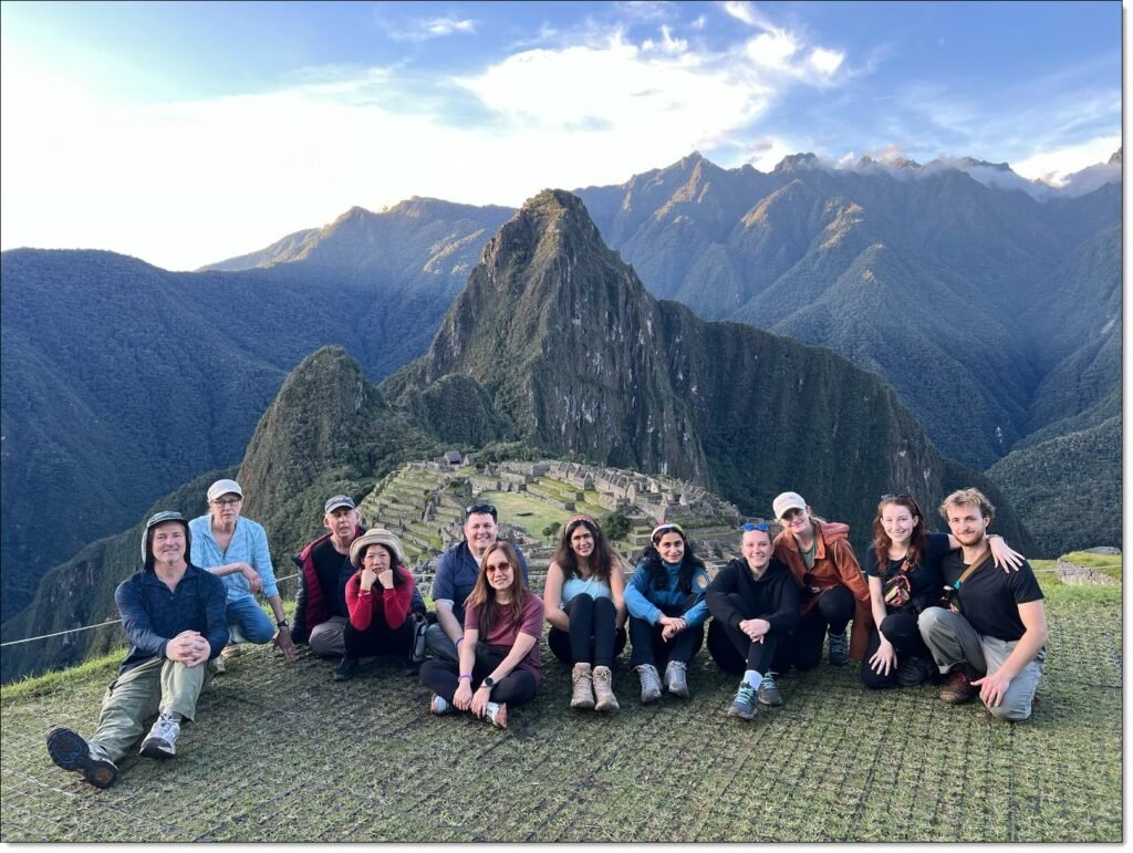 Our Inca Trail Hike Group, taken on an overlook with machu Picchu, Peru, in the background. Hike was organized by Alpaca Expeditions.