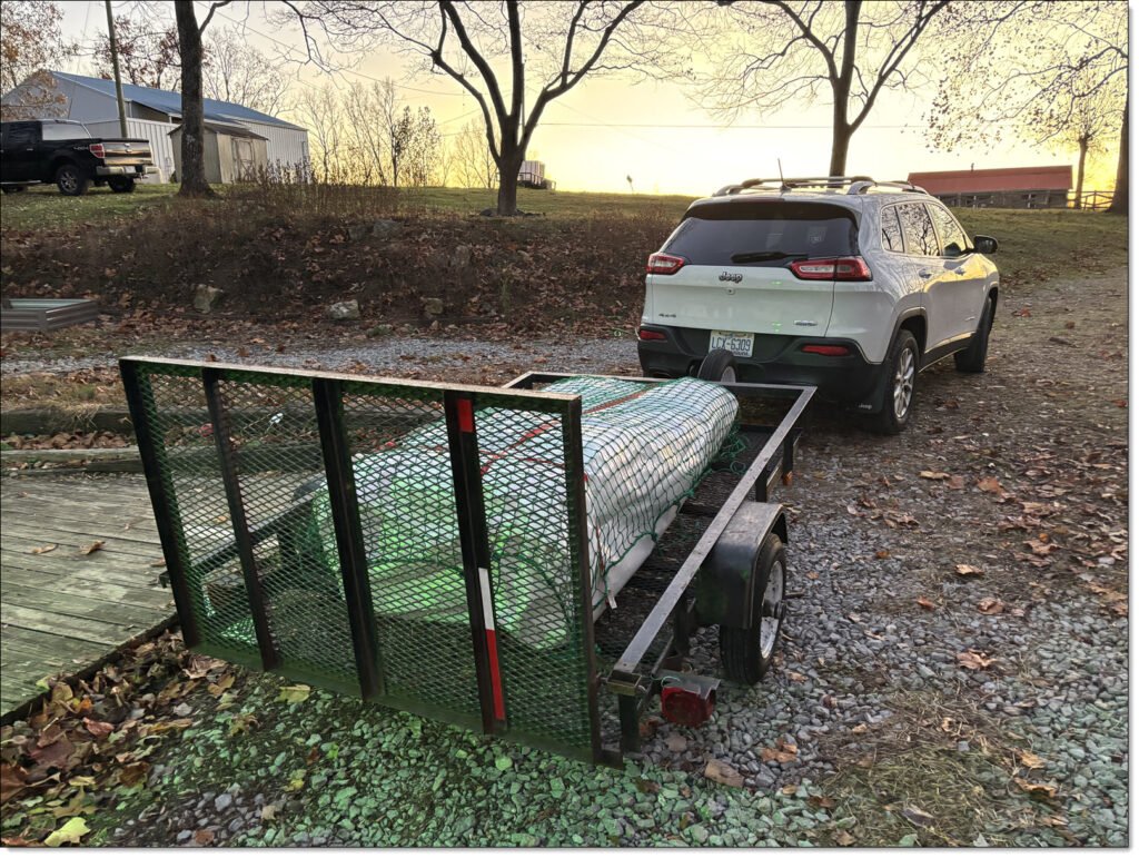 Hauling a piece of antique furniture from Tennessee with the Jeep and utility trailer. 