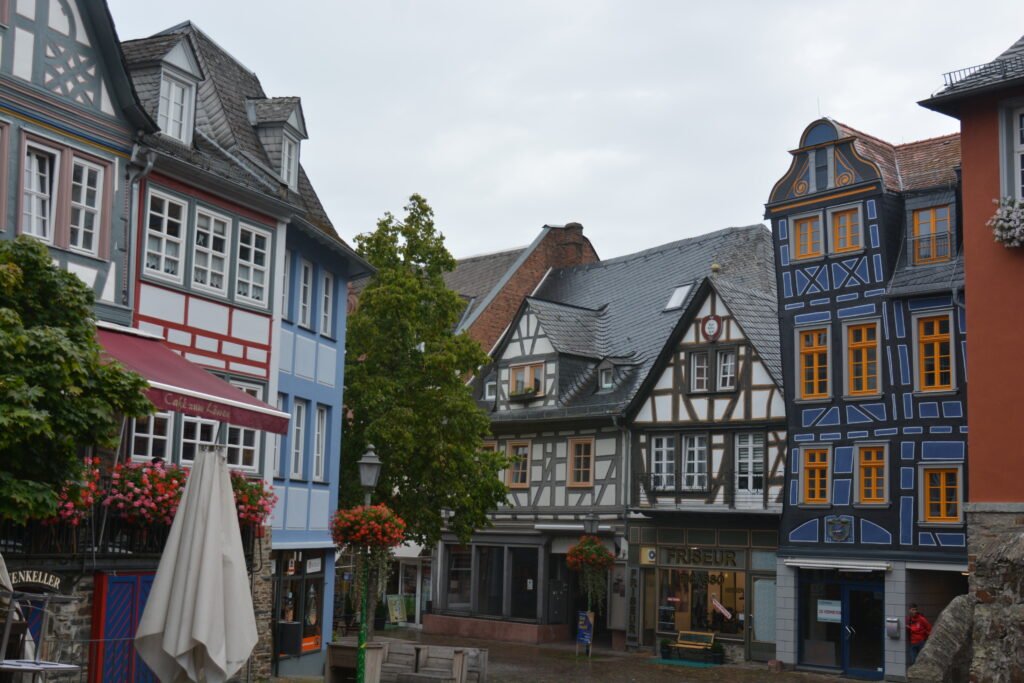 street scene of quiet day in the historic center of a medieval-era german village 