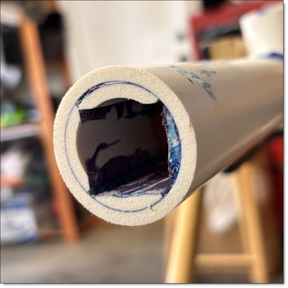 Showing the end of an axle piece, with inner PVC segments creating a guide for the square axle. 