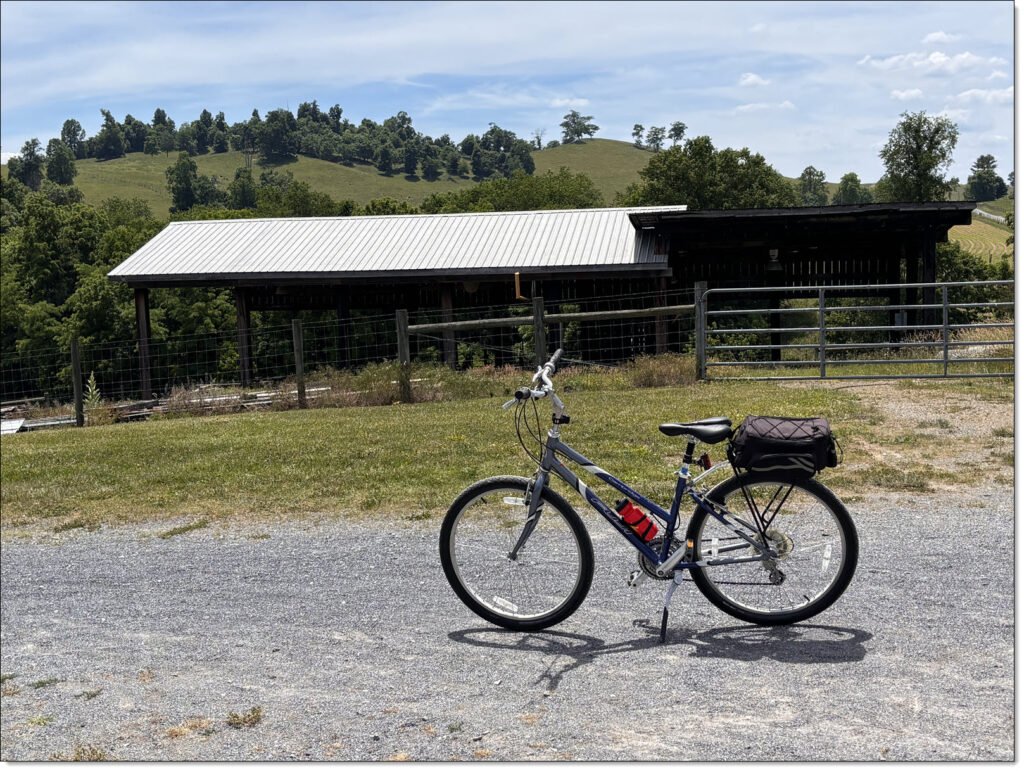 My 2000 Fuji Cambridge Commuter bike, taking a break while crossing a farm along the Virginia Creeper Trail.
