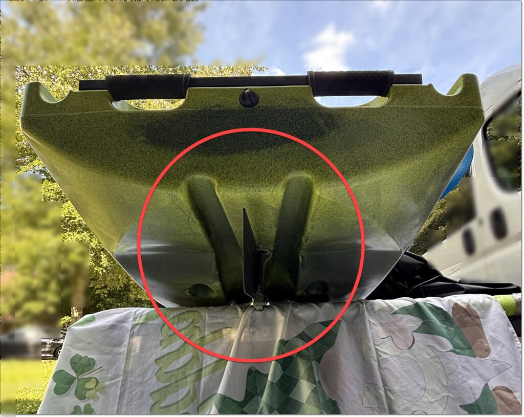 Underside of a Native Watercraft Slayer Max Ten Propel Kayak, showing the twin channels forming a unique hull form. According to the manufacturer, this helps provide hull stability. 