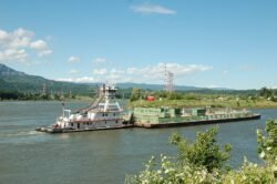 A Pusher Tug with Barge on the Columbia River, Oregon