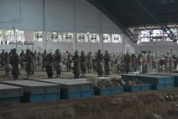 Restoration in Process terracotta warrior figures in various stages of repair and restoration