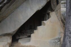 This was a storage area built using cut stone and natural stone formation in Machu Picchu.