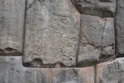 A detail view of cut and dressed stone, some as large as four feet tall