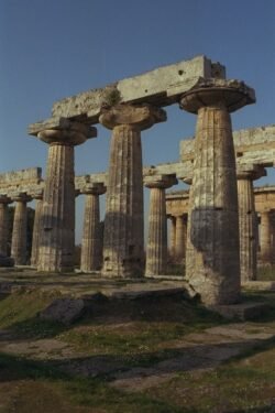 A series of ornate stone columns with connecting top stones arranged as a temple.