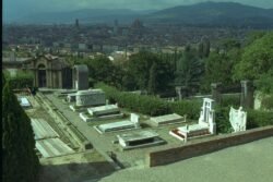 A panoramic view of a cemetery with ornate grave markers and headstones