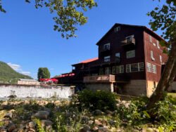 The Damascus Old Mill Inn, a historic building situated in Damascus, Virginia. Located next to a waterfall on Laurel Creek, running through the town. Now converted into a hotel featuring charming guest rooms , the property also houses The Old Mill Restaurant.