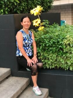 Winnie Next To An Artificial Sunflower Winnie Charest posing next to an internally illuminated sunflower