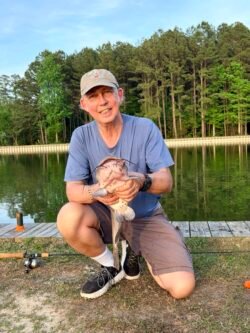 Ron Charest holding a large catfish