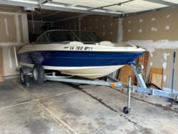 Bayliner 175BR named Sea Dragon, parked inside the Garage