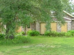 Front of House Boarded Up