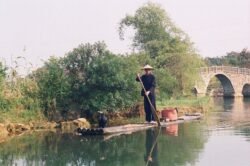 Poling Boat on the Li Jiang River