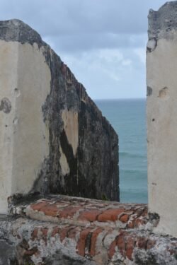 Looking Out A Battlement of Castillo de San Cristobal