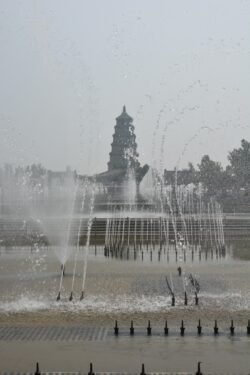 Looking Across a Plaza Water Fountain Towards Wild Goose Pagoda Looking Across a Plaza Water Fountain Towards Wild Goose Pagoda, Xi'an, China