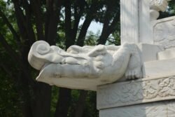 A Chinese Gargoyle of Wild Goose Pagoda An architectural detail of a white marble dragon sculpture, on the corner of a building Wild Goose Pagoda, Temple, Xi'an, China