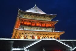 A Nighttime View of the Drum Tower of Xi'an A traditional Chinese drum tower illuminated from the inside