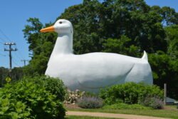 A large white building in shape of a duck