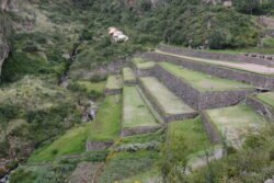 Mountainside Terraces supported by Stone Walls built in encased coursed masonry construction. Located in the Sacred Valley archeological site of Pisaq (Pisac).
