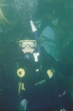 Diver in A Kelp Forest