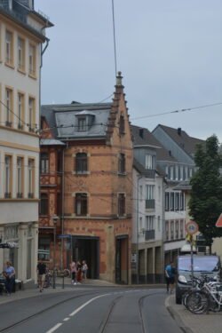 gothic-themed buildings nestled along a narrow city street