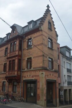 lovely brick building on a street corner