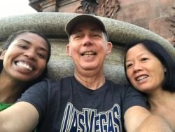 three people looking into the camera taking a selfie